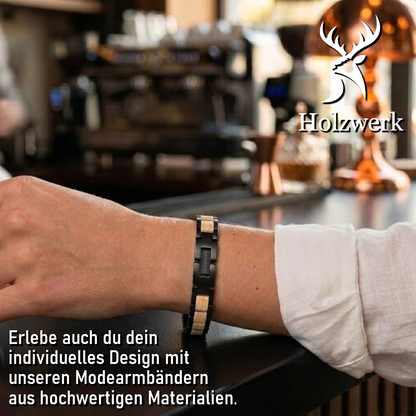Holzwerk EMMSEE schwarz-beiges Holz Armband aus Olivenholz und Edelstahl am Handgelenk getragen